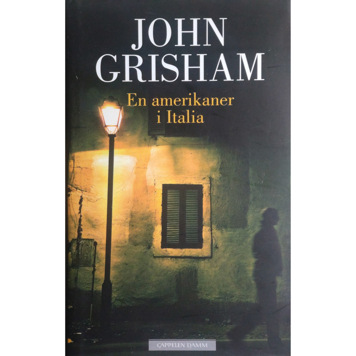 En amerikaner i Italia, brukte bøker av John Grisham