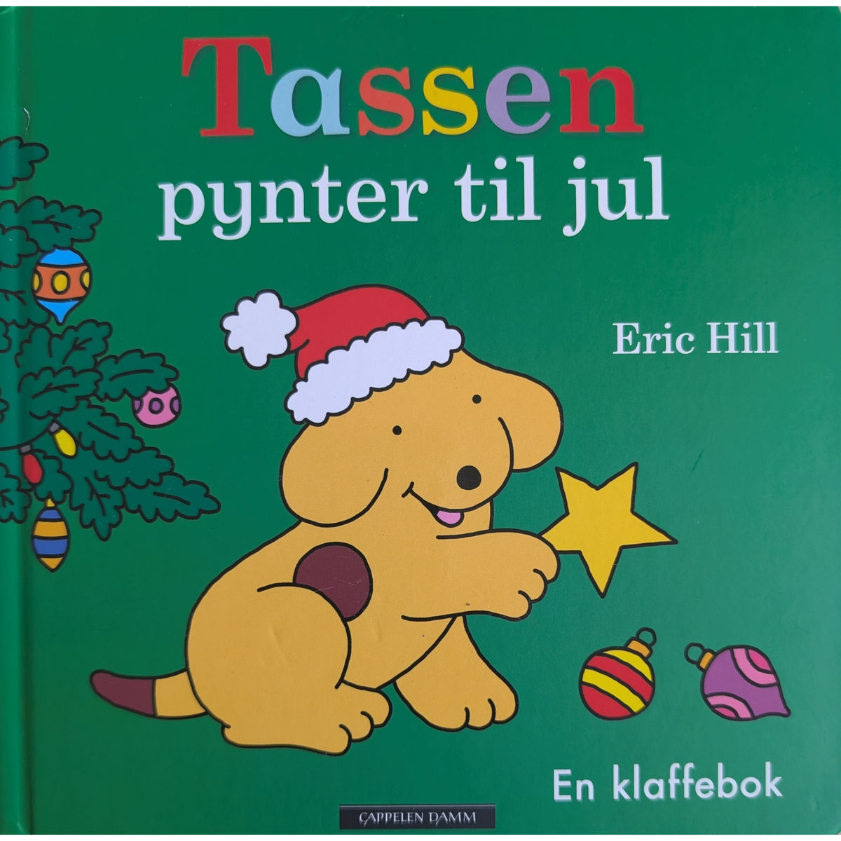Tassen pynter til jul, brukte bøker av Eric Hill. Kartonert klaffebok